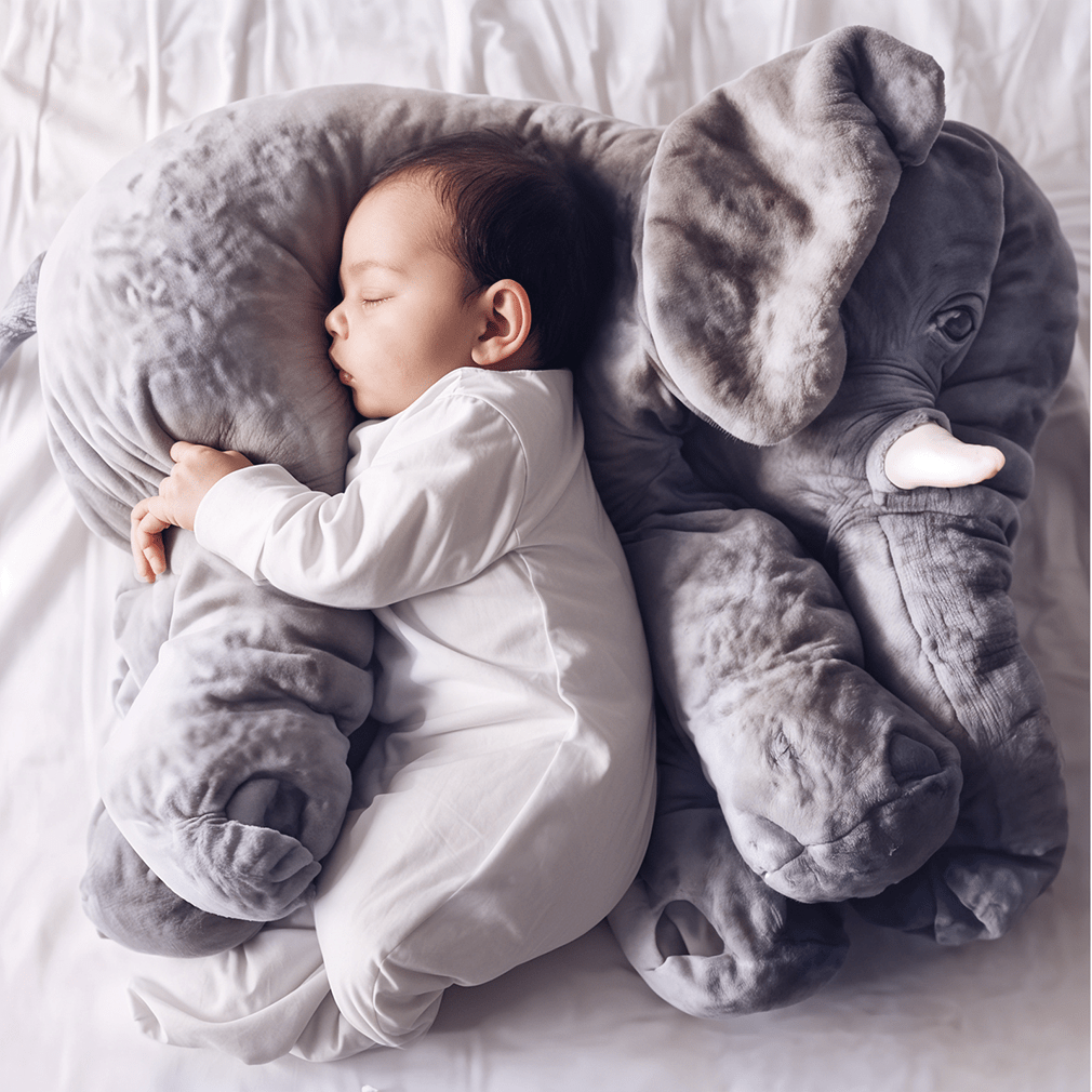 Plush elephant pillow for kids, perfect for cuddling and playtime, featuring super-soft comfort cushion, available in two sizes. 0